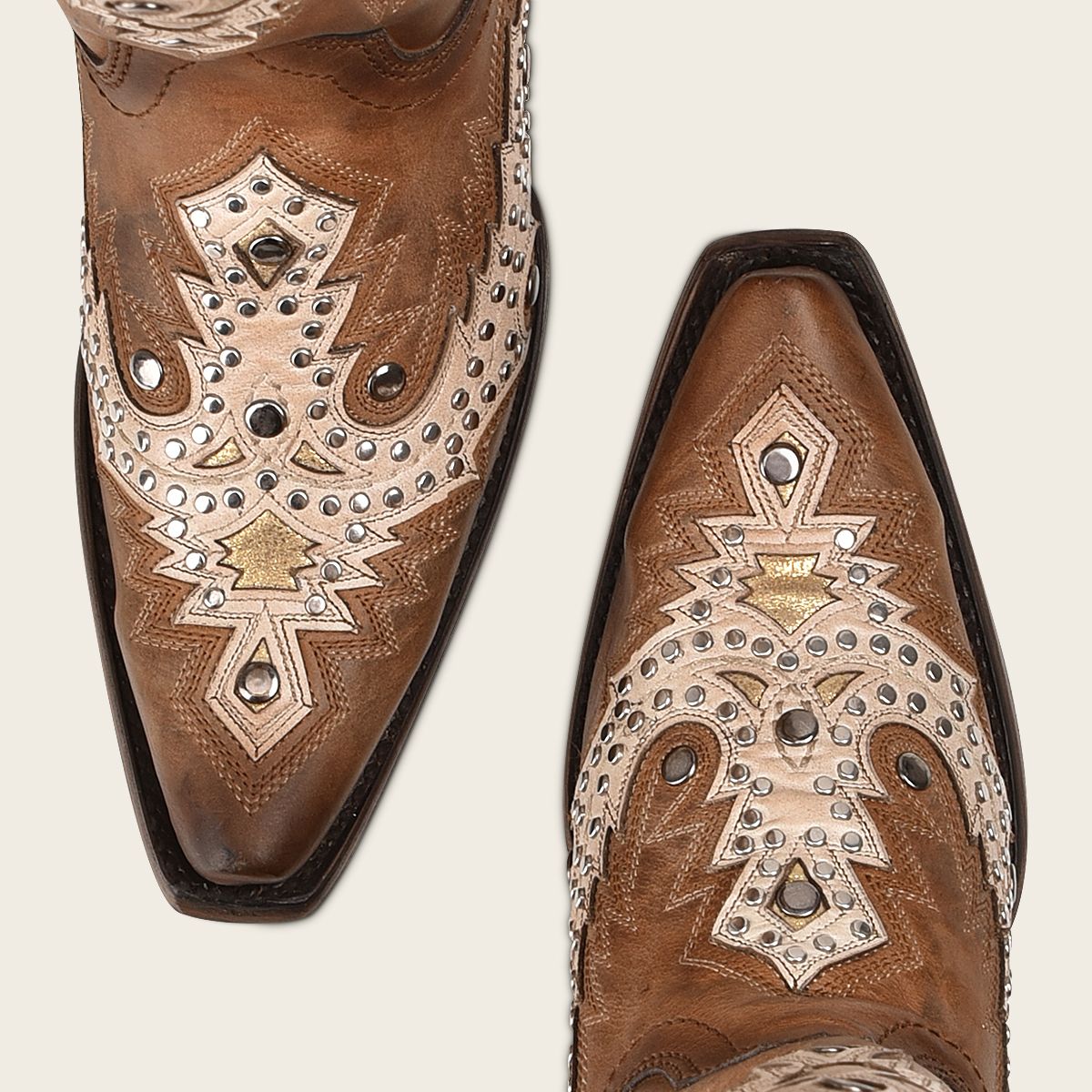 Honey brown leather cowboy style boot with shiny finish