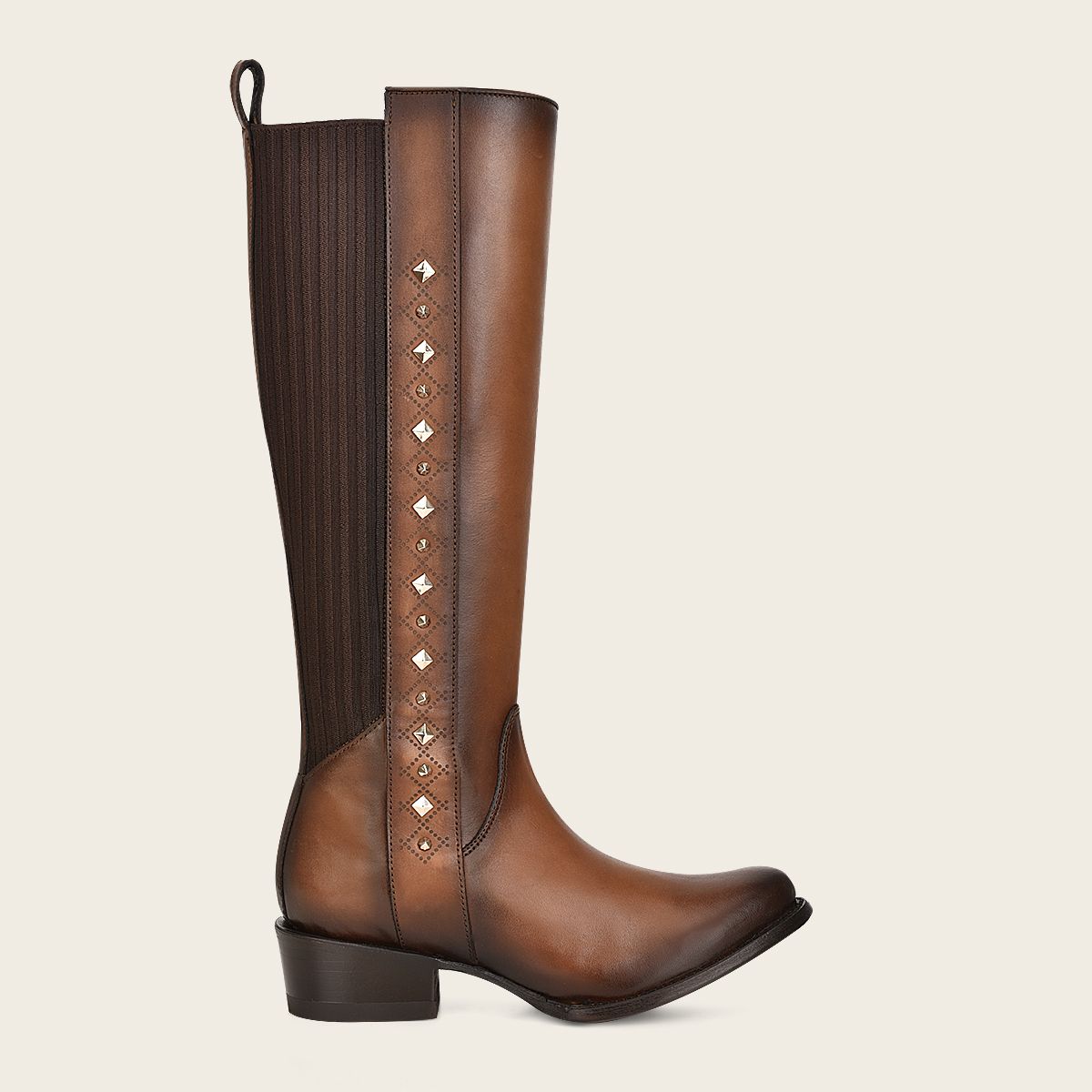 Brown high boot with laser engraving and studs