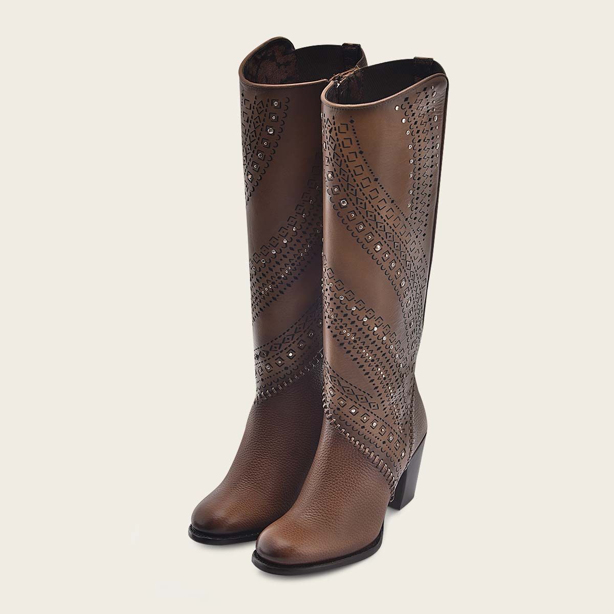Decorated brown leather tall boot with perforations
