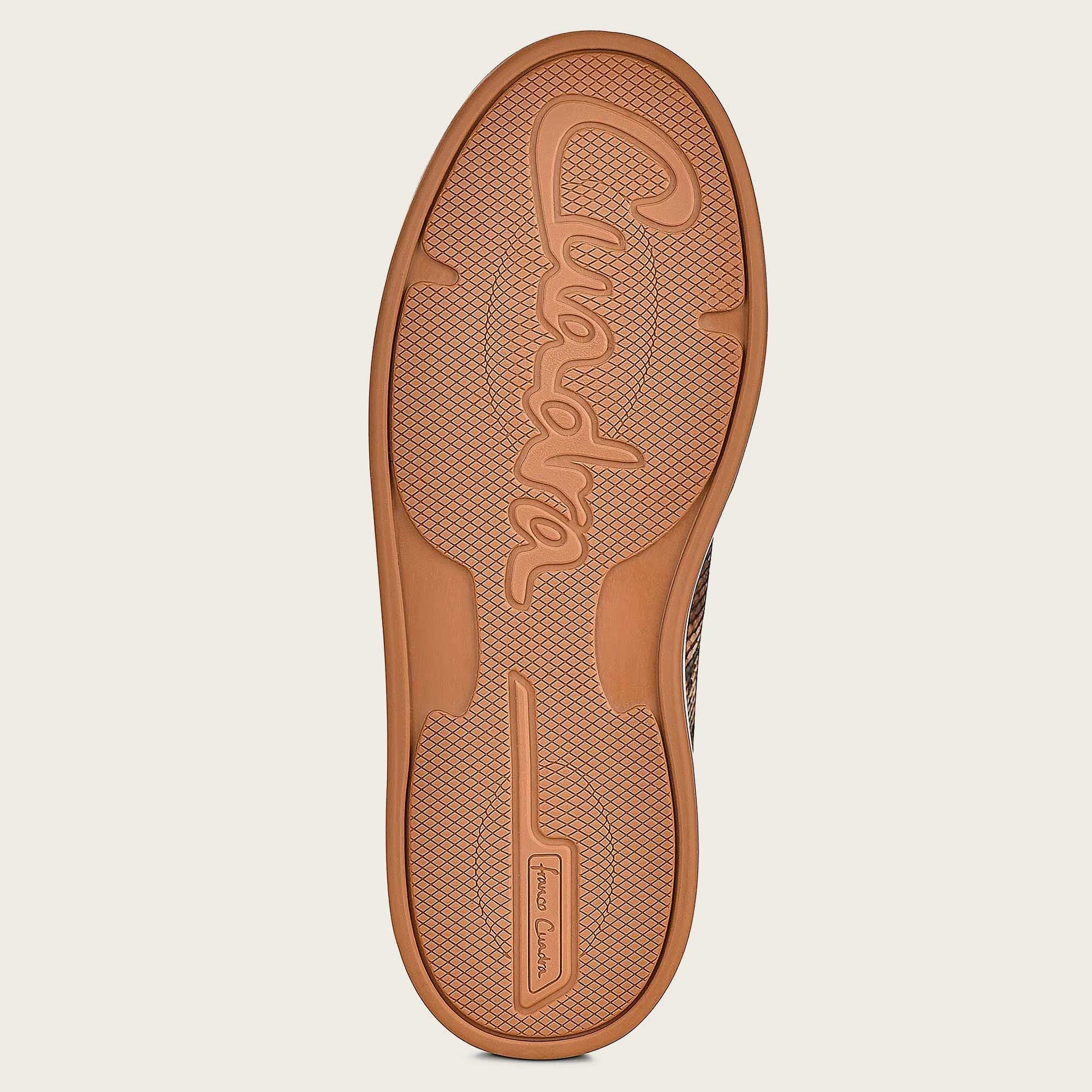The matte Franco Cuadra logo on the sole subtly conveys the brand's legacy