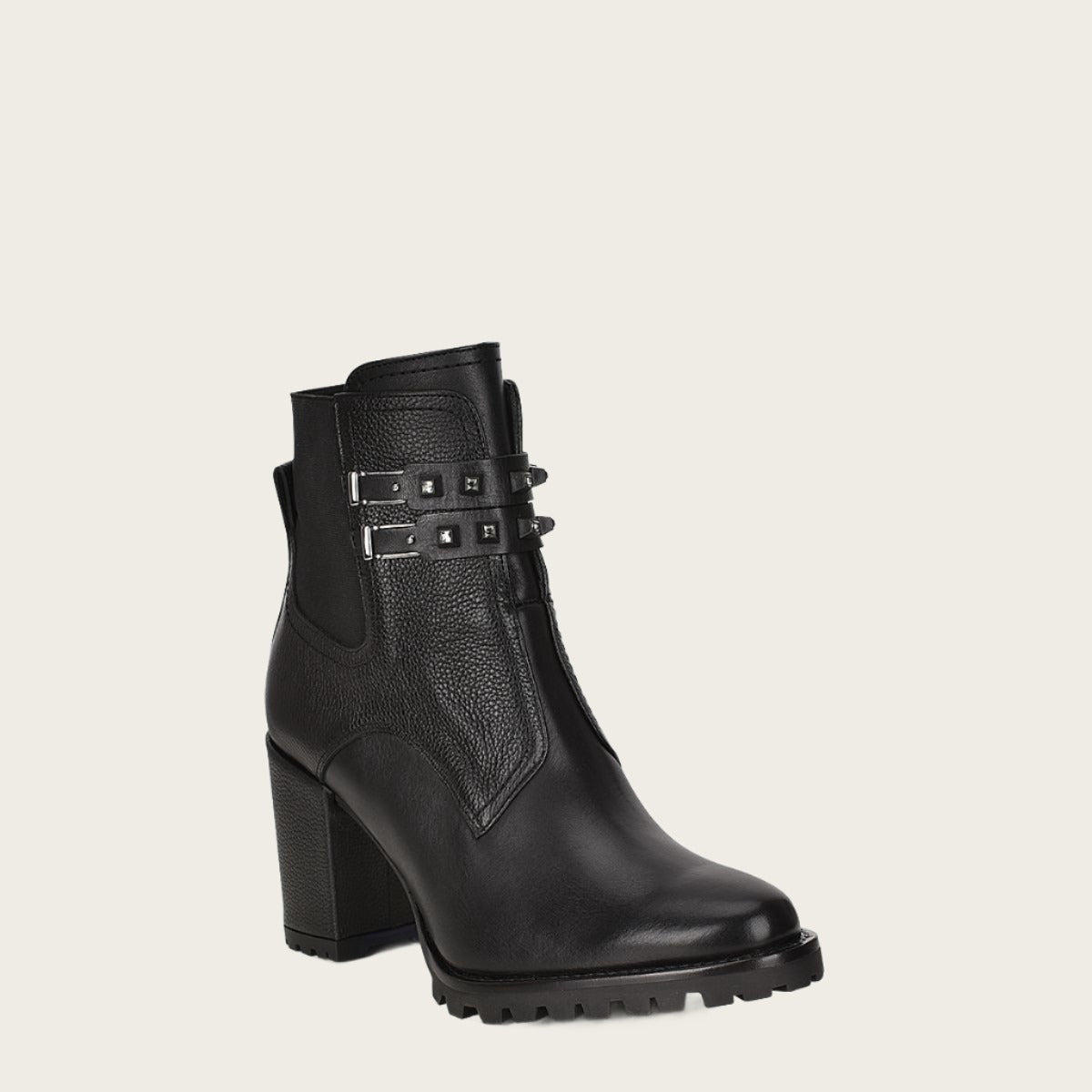 This black combination leather urban ankle bootie is perfect for the modern woman.