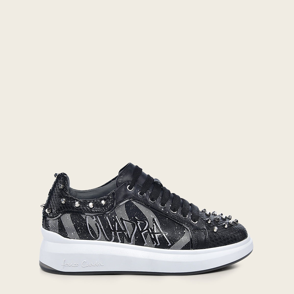 Genuine python black leather sneakers and metallic studs