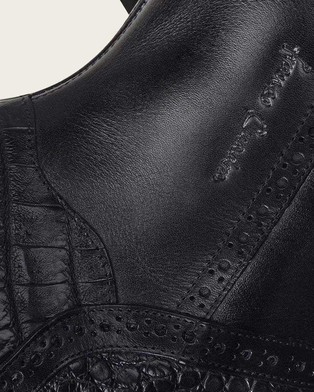 Subtle brocade & Cuadra logo: Distinctive design elevates your black boots.