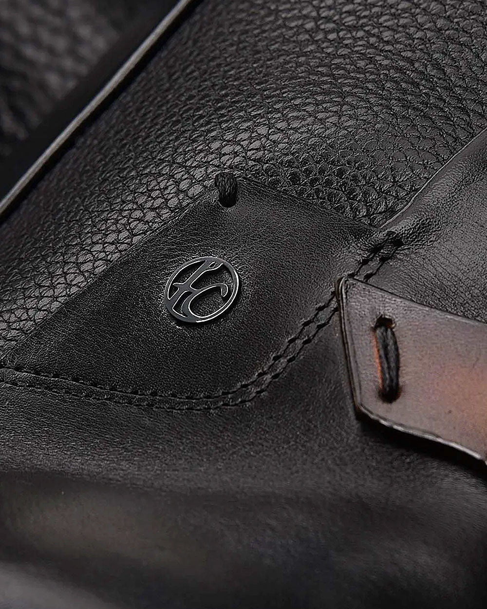 Cuadra Monogram & Logo: Black deer leather boots with designer touches.