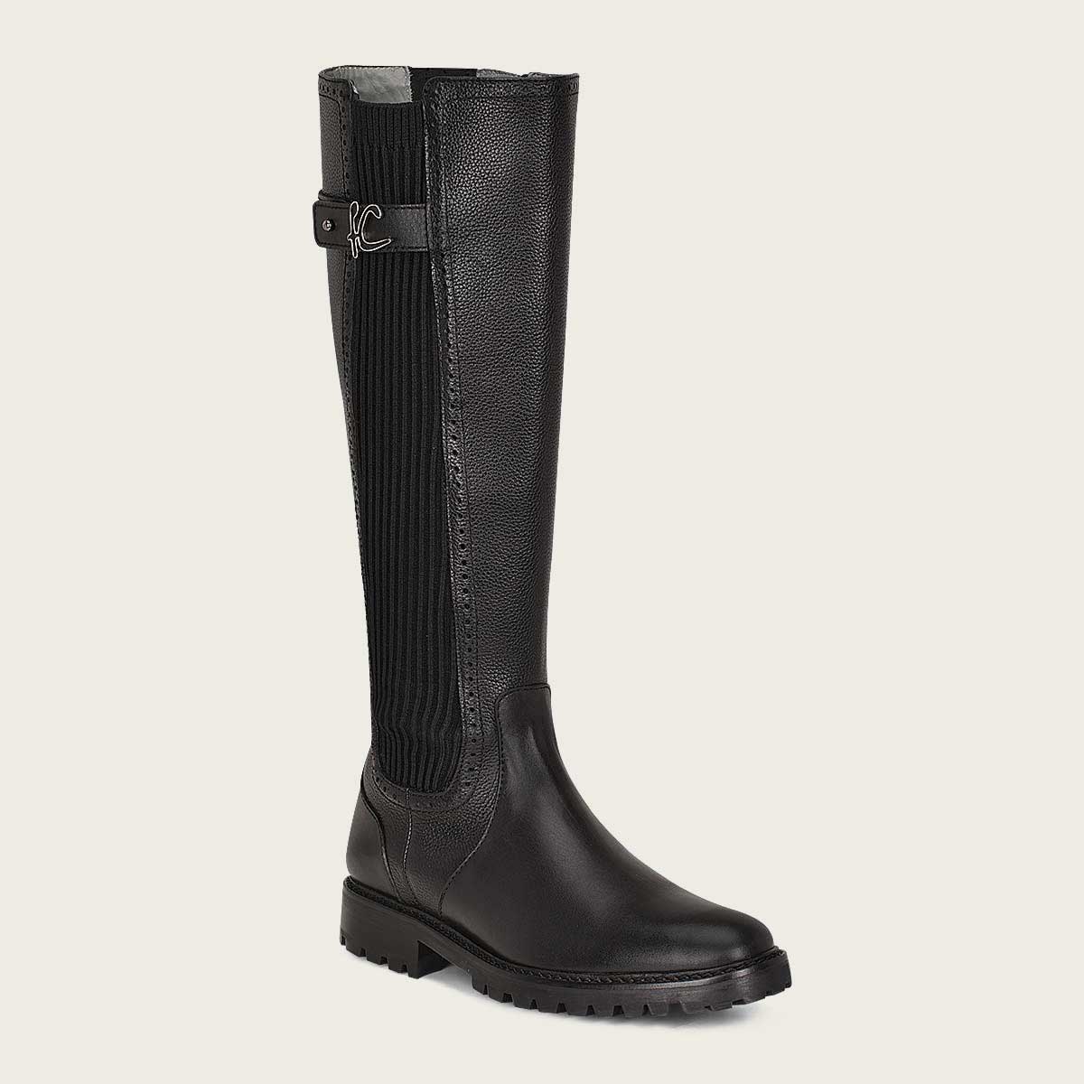 black bovine leather high boot, for women in bovine leather. It presents details with contrasting textures, brocade details, a metallic application.