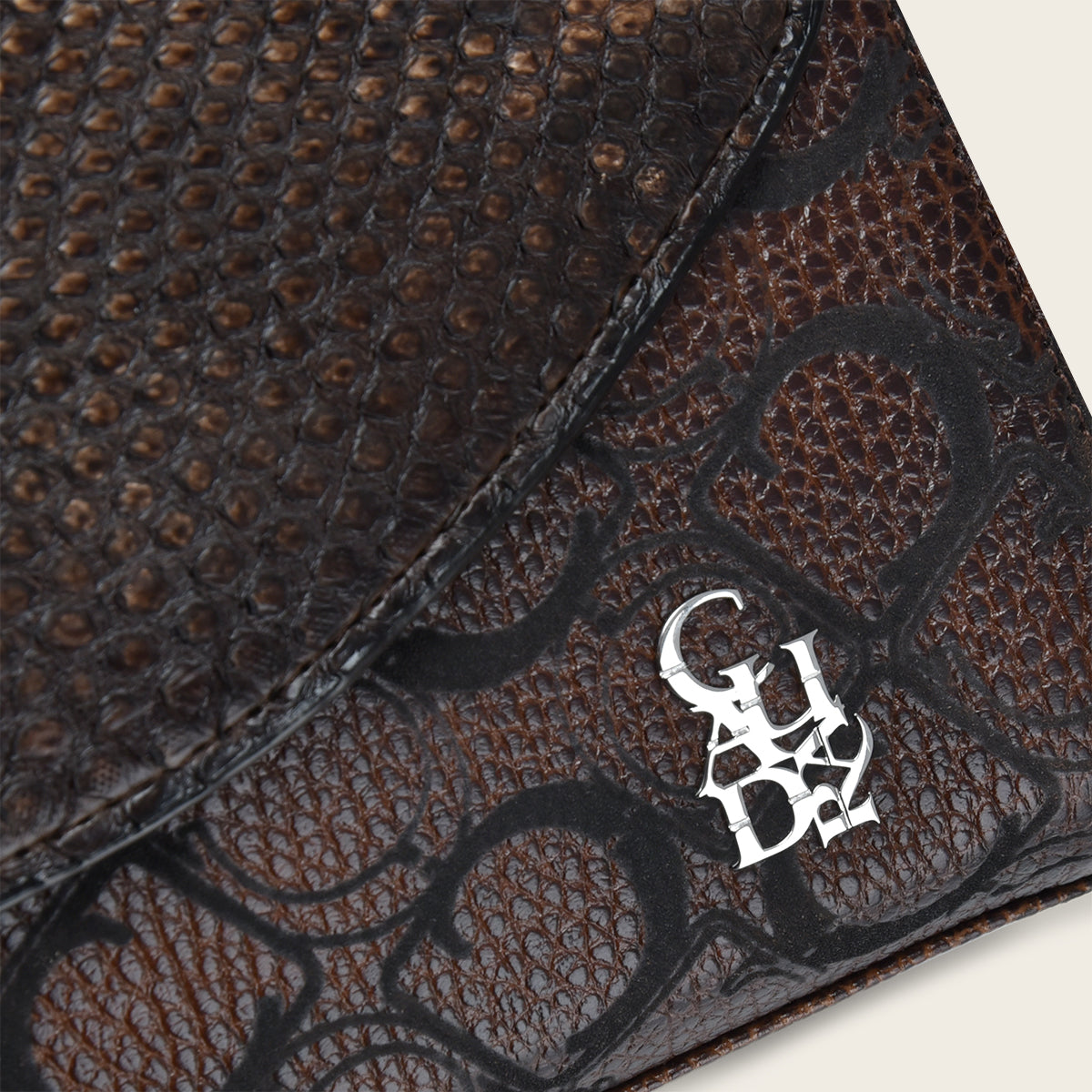 Dark brown exotic leather handbag with Cuadra Monogram leather