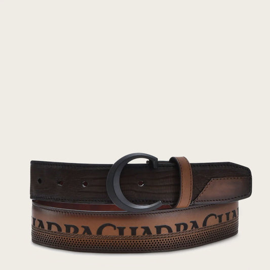 Engraved honey exotic leather belt with black monogram buckle