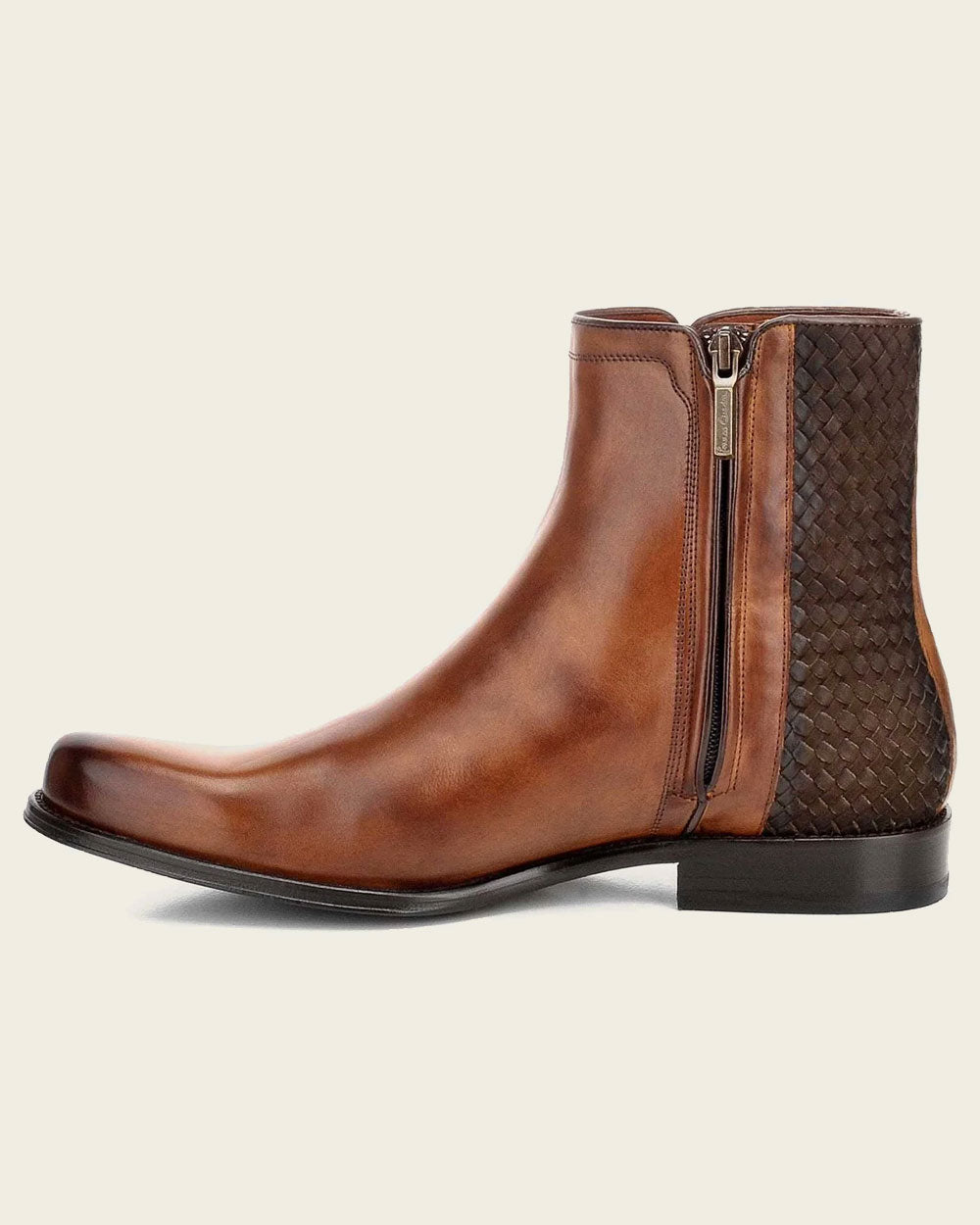 The handwoven application in the back adds an extra touch of detail and texture. Making this boot stand out from the crowd.