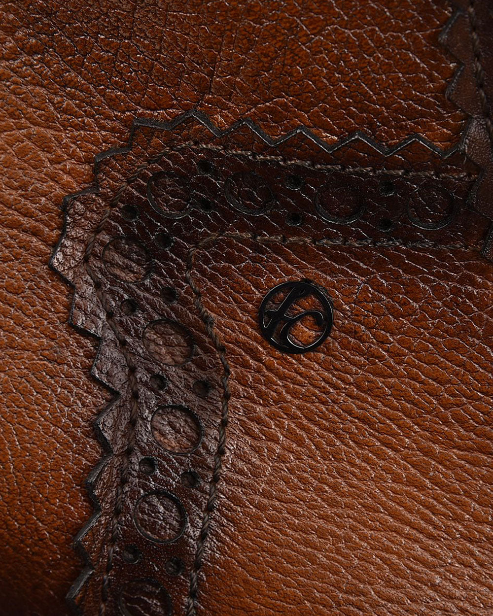 Premium Bovine Leather: Crafted from top-quality bovine leather, ensuring durability and timeless elegance.