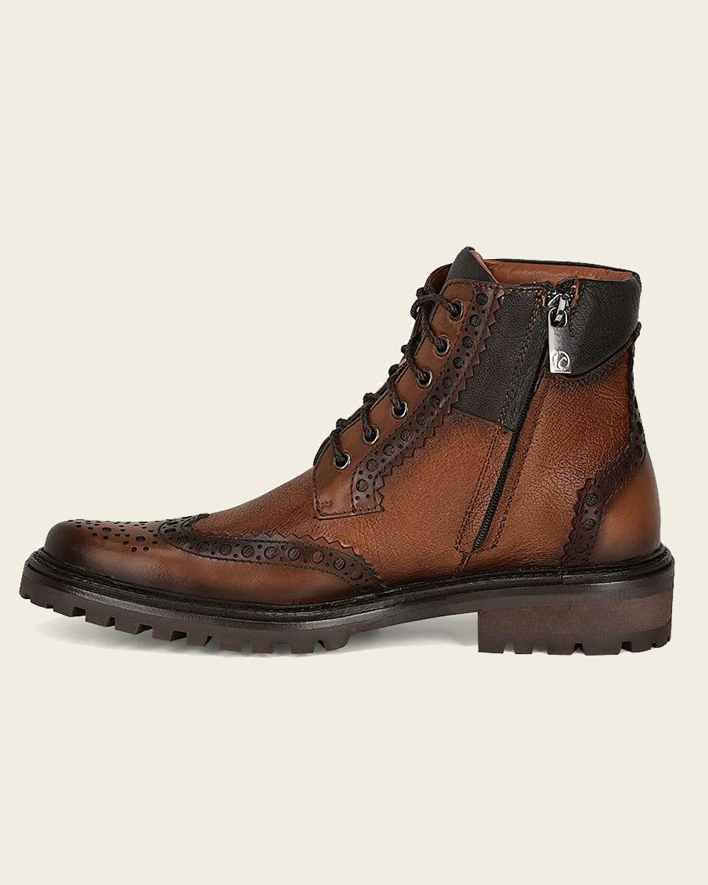 Metal Monogram Application: Flaunting the iconic Franco Cuadra monogram in metal on one side, this boot exudes luxury and exclusivity.