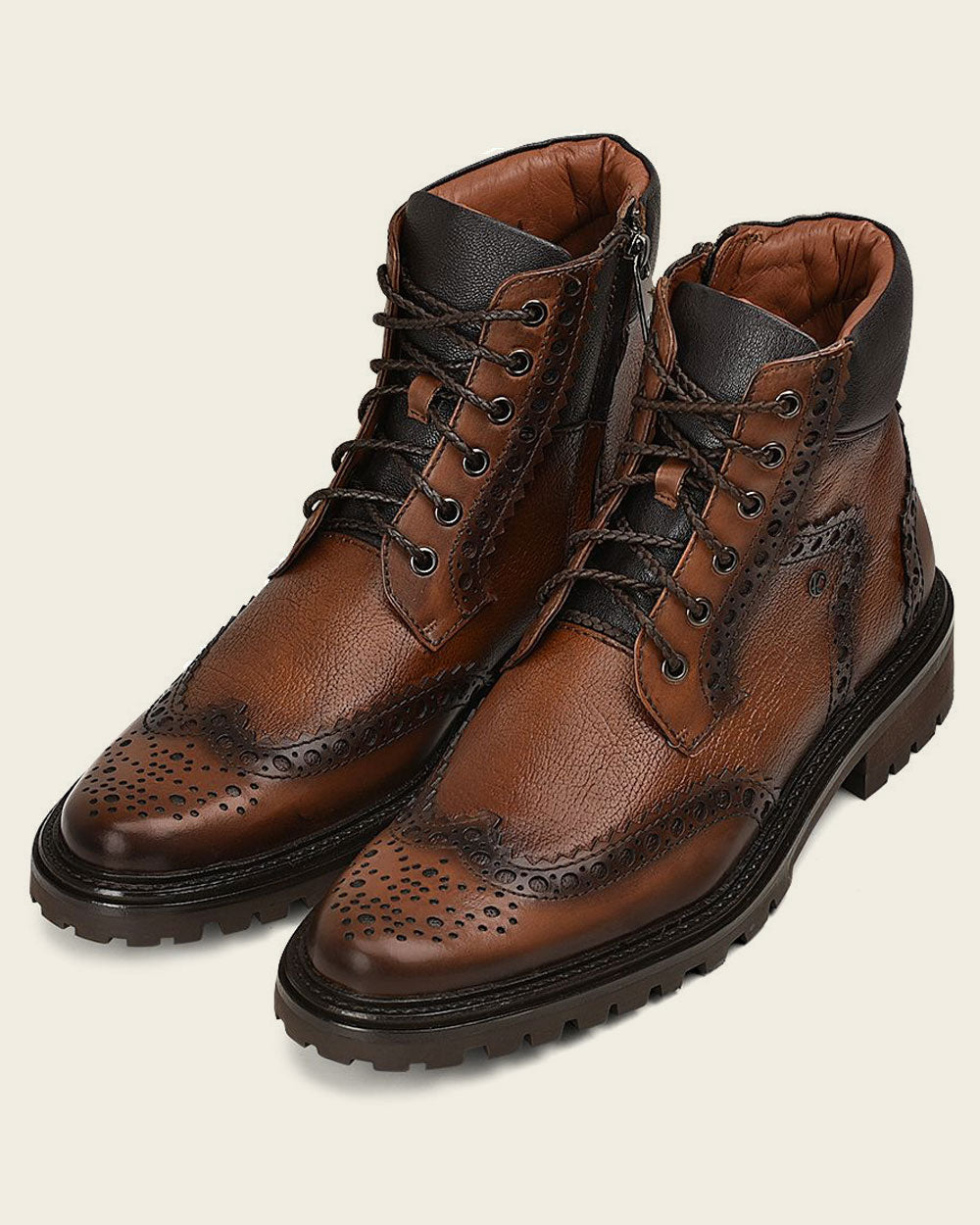 Introducing the ultimate blend of style and functionality, our men's boot crafted from premium bovine leather is a must-have addition to your footwear collection. With meticulous attention to detail, this boot seamlessly combines classic design with modern elements for a standout look on any occasion.