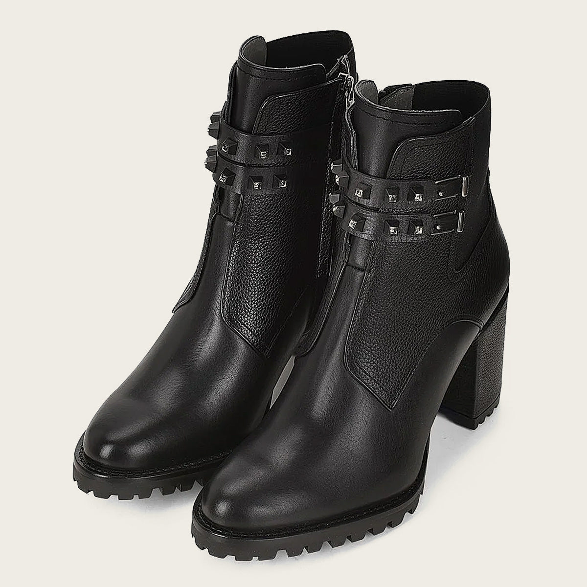 Our black combination leather urban ankle bootie effortlessly combines fashion and functionality..