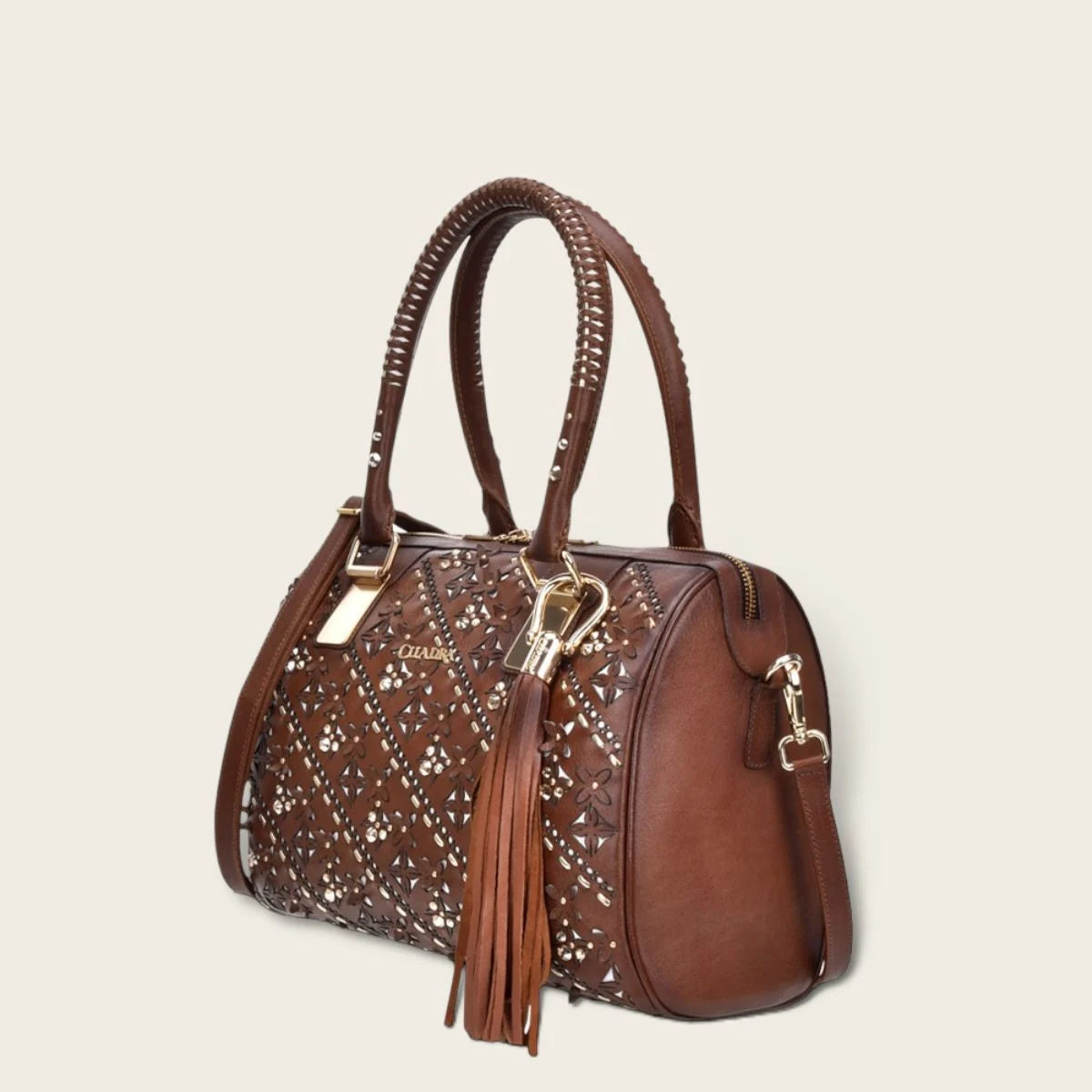 Brown handbag with Austrian crystals and perforated floral motifs