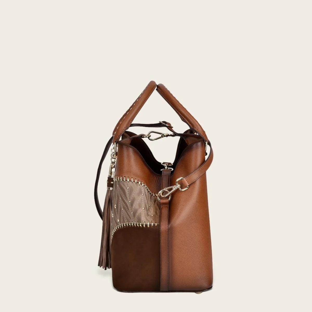 Brown leather tote bag with contrasting geometric motifs