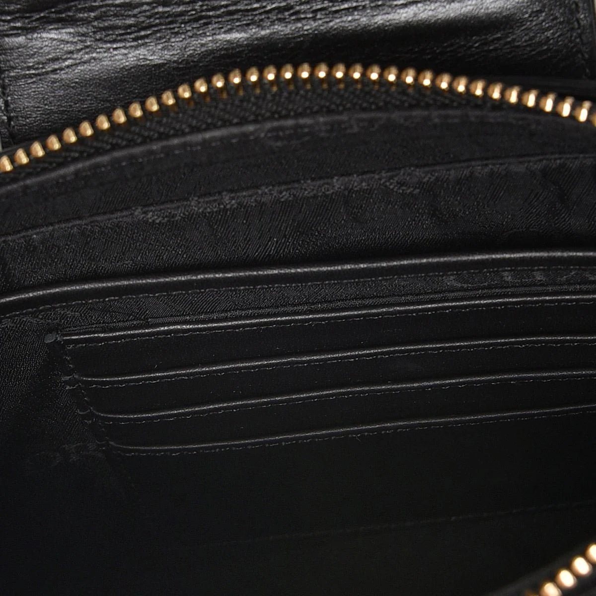 Black exotic leather shoulder bag with handmade interweaving detail