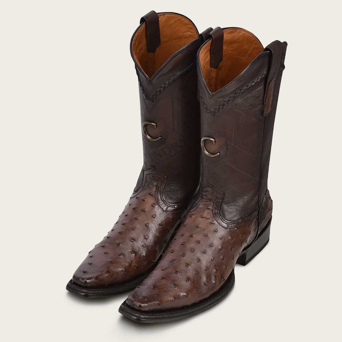 Whether at an event, outdoors, or making a style statement, these premium engraved dark brown leather boot exceed expectations. 