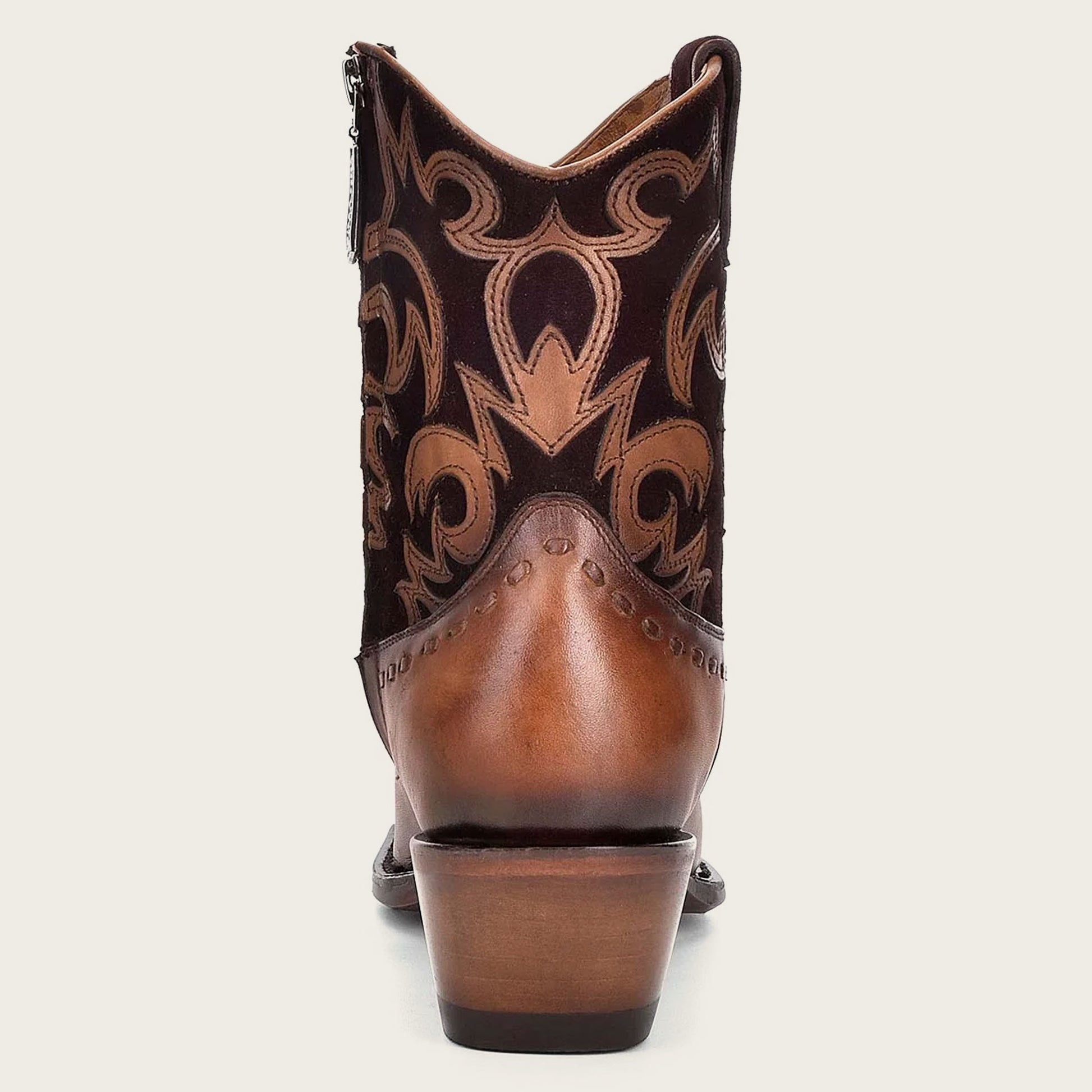 Brown Western leather bootie - high-quality leather with classic pointed toe and slanteIndulge in the bold and beautiful aesthetic of our Western Chic booties, and let them be the centerpiece of your outfit.