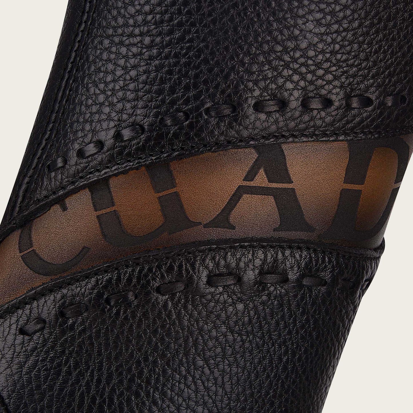 Engraved black leather boot - a classic and stylish addition to your footwear collection.