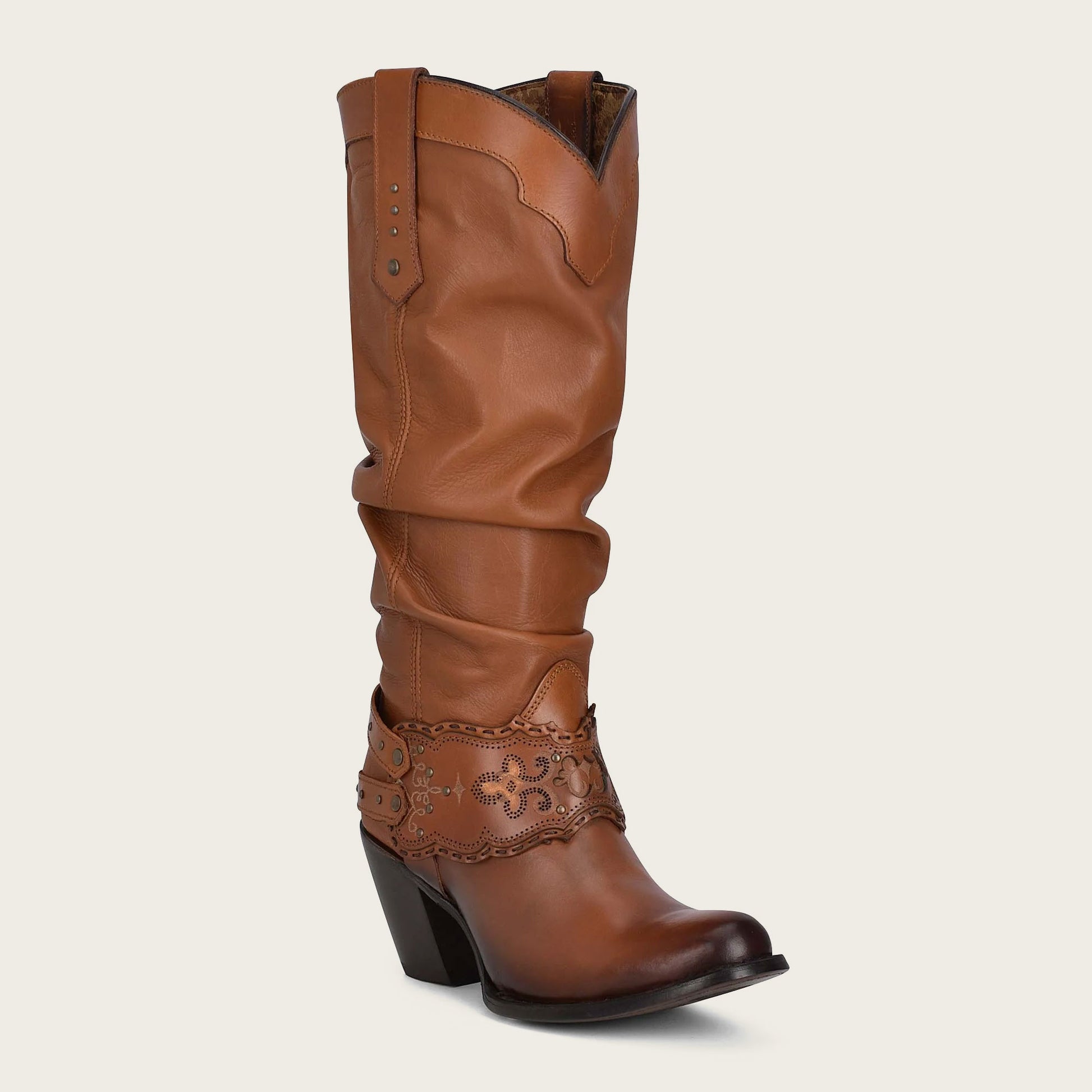 Step out in style with our honey leather boot, complete with beautiful engravings and a sleek silhouette.
