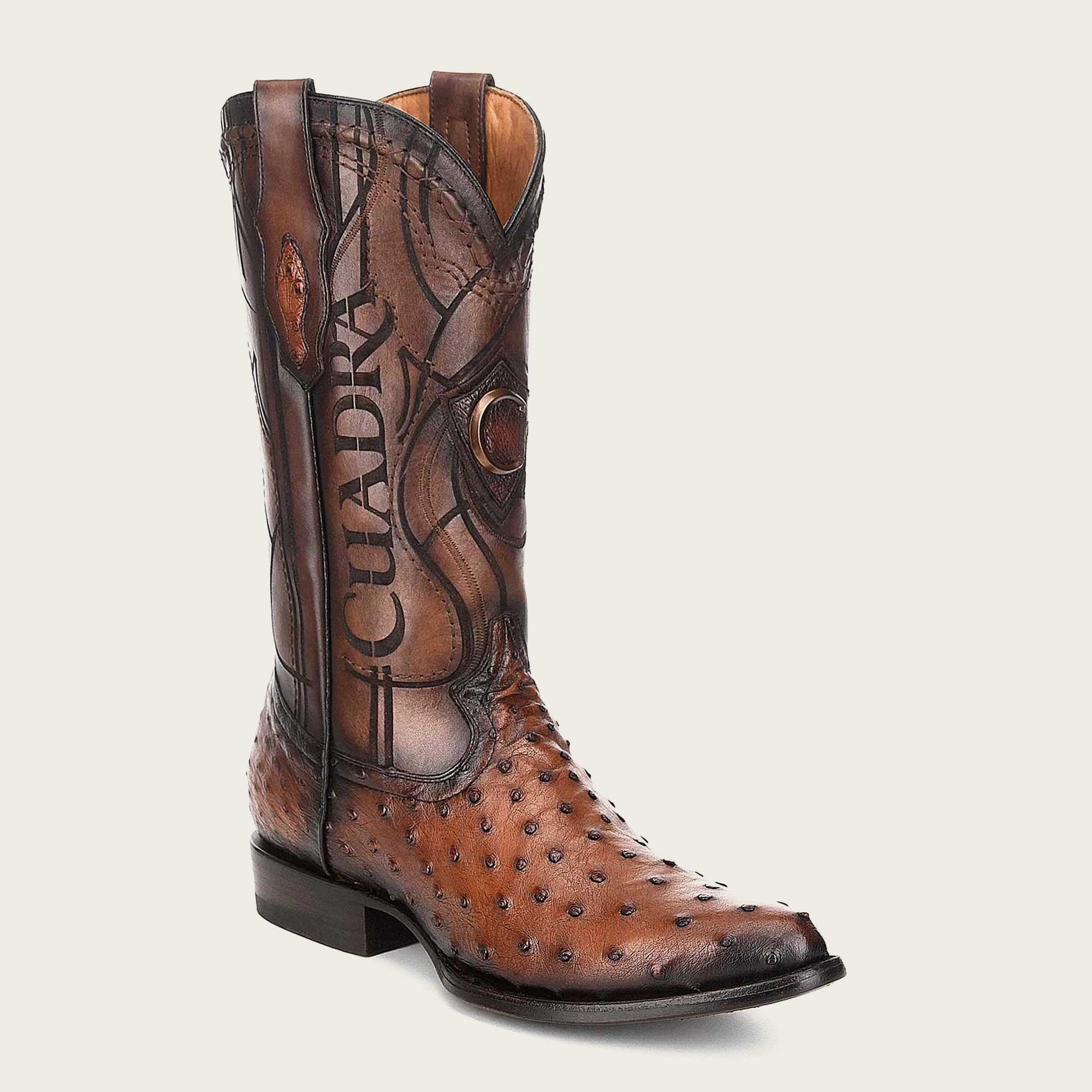 Elevate your style with these exceptional Western engraved brown leather boot for men, meticulously handcrafted from genuine ostrich and bovine leather.