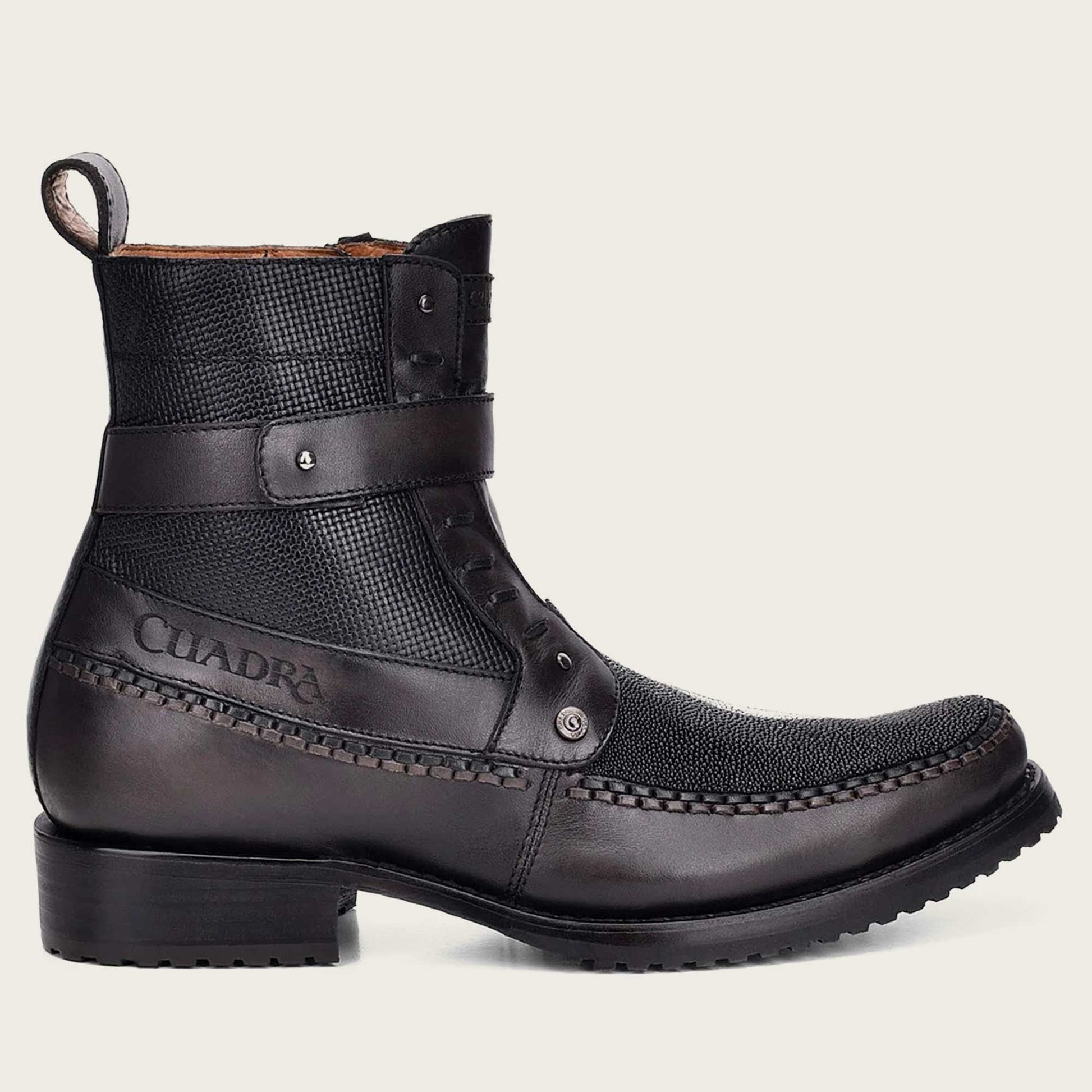 Step up your style with our handwoven black leather boot. Perfect for any occasion, these boots are a timeless addition to your wardrobe.