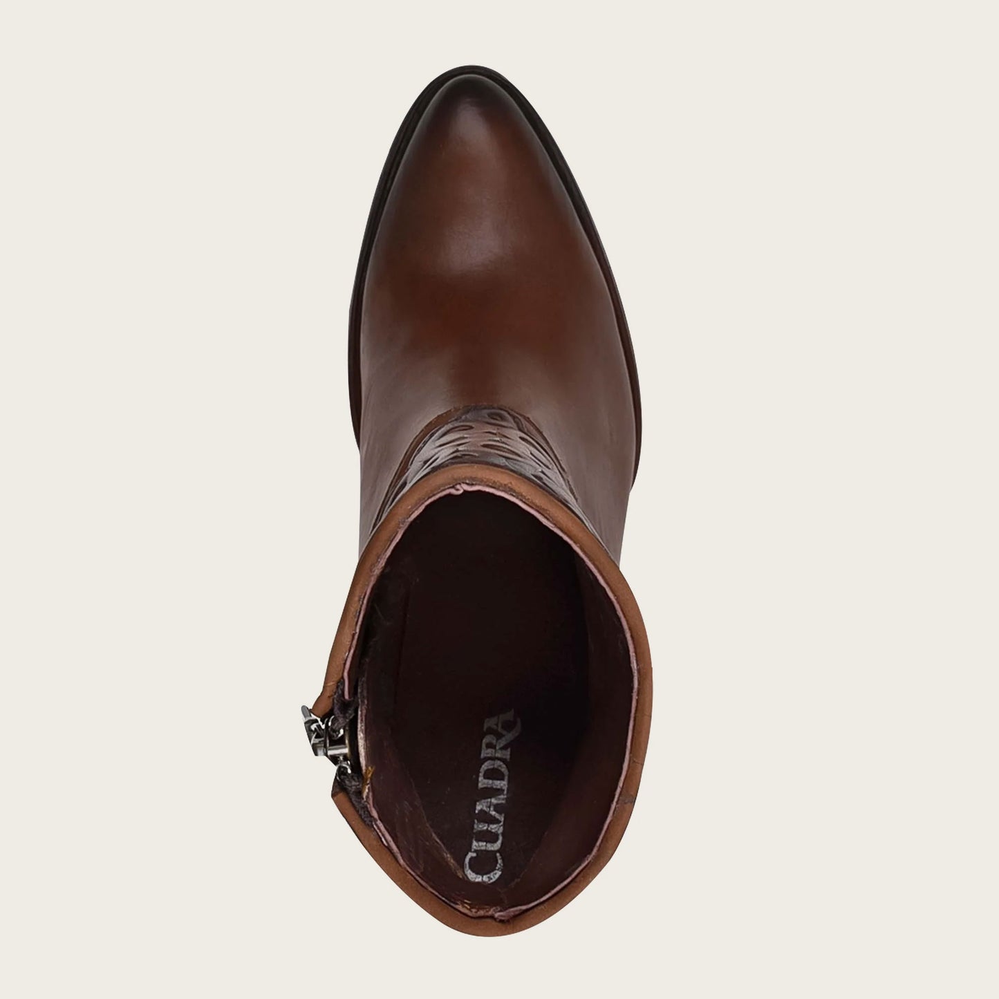 Stylish and versatile brown leather bootie with a sleek design, perfect for any occasion.