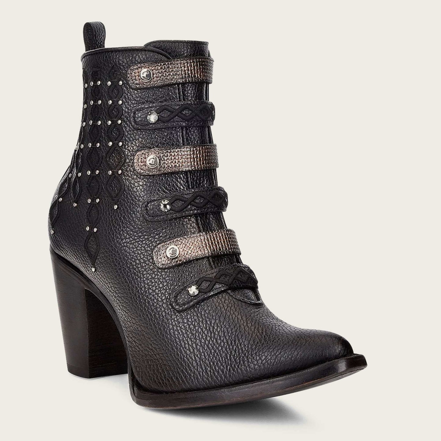 An image of a black leather bootie with intricate embroidery details and sparkling Austrian crystals