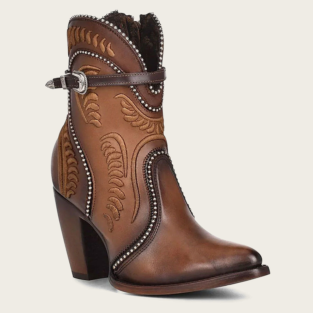 Step into sophistication with our exquisite women's embroidered honey leather western bootie.