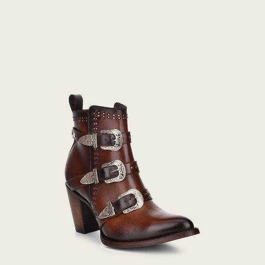 Handwoven brown leather bootie with triple front straps and metallic buckles for women.