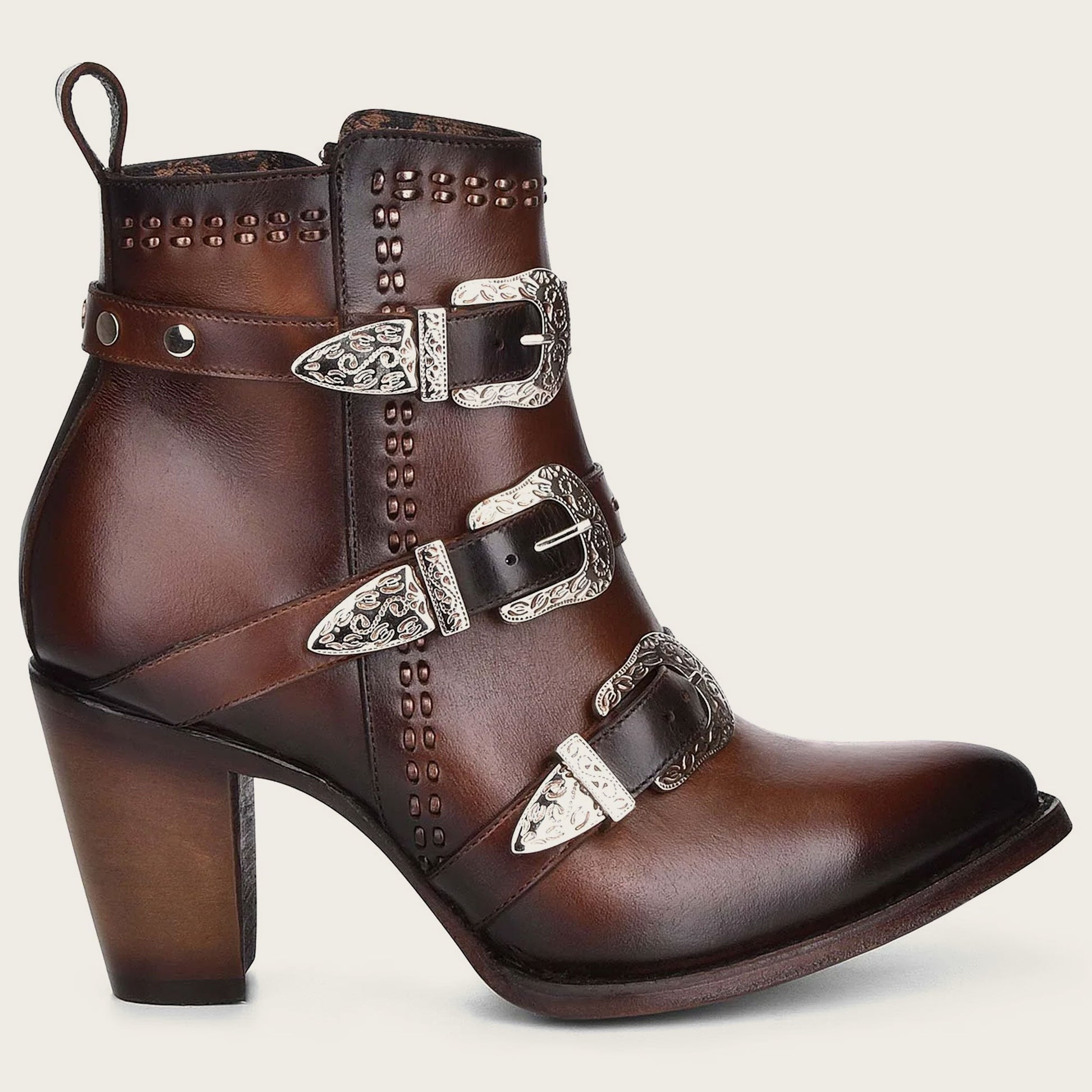 Featuring three adjustable leather straps with metallic buckles, this shoe adds sophistication to your look.