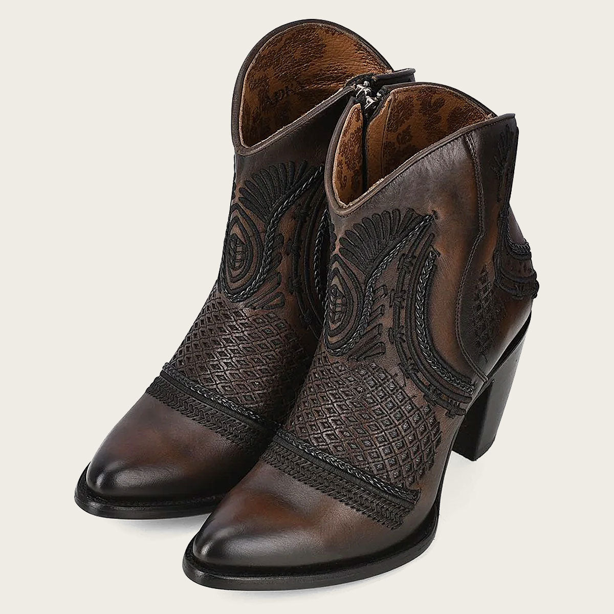 The shaded finish enhances the overall aesthetic of the boots, making them perfect for any occasion.