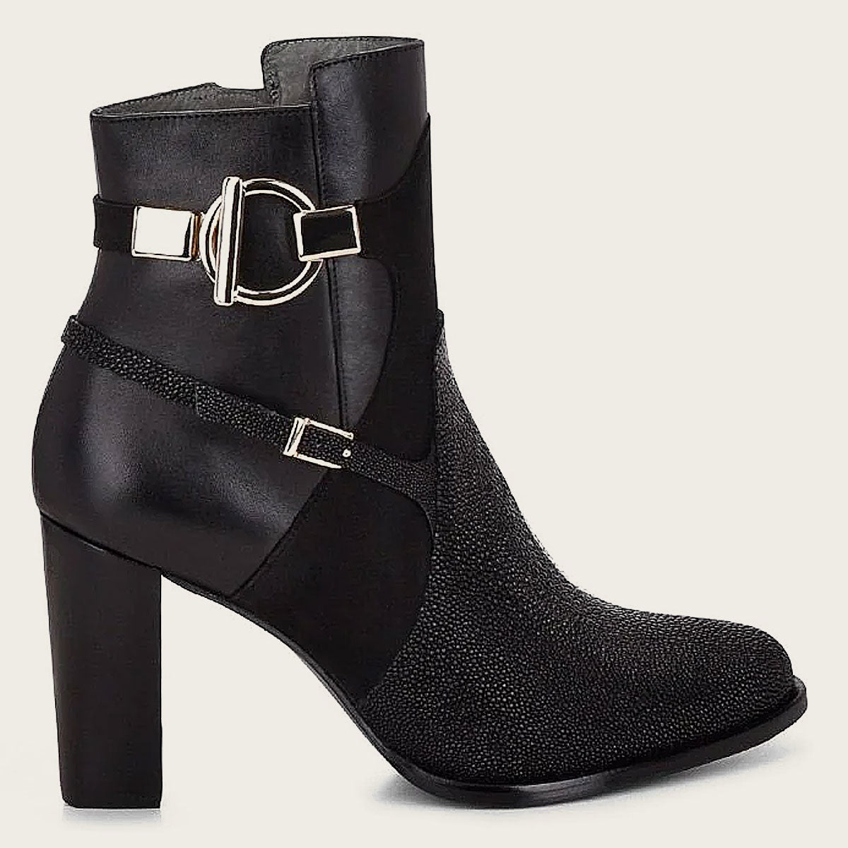 Close-up of black textured ankle boot with pointed toe, made of genuine exotic stingray leather.