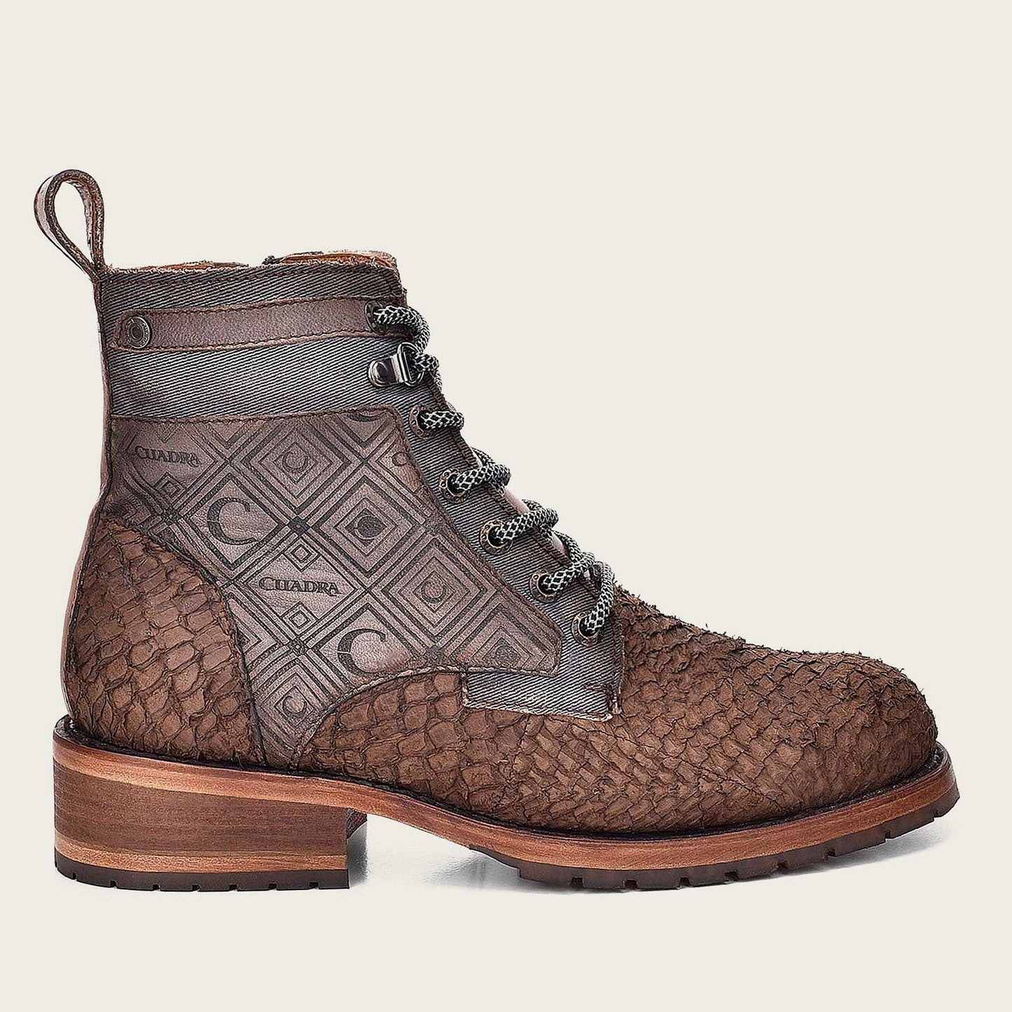 Stylish brown poisson leather boot for men, featuring engraved details for a unique touch.