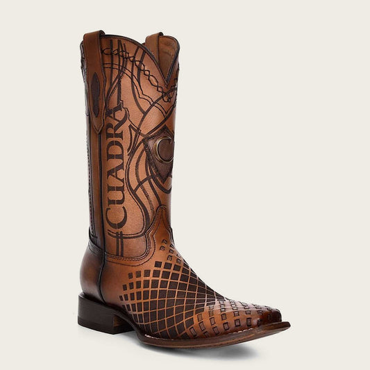Stylish men's western boot in honey leather with intricate laser-engraved details and expert craftsmanship.
