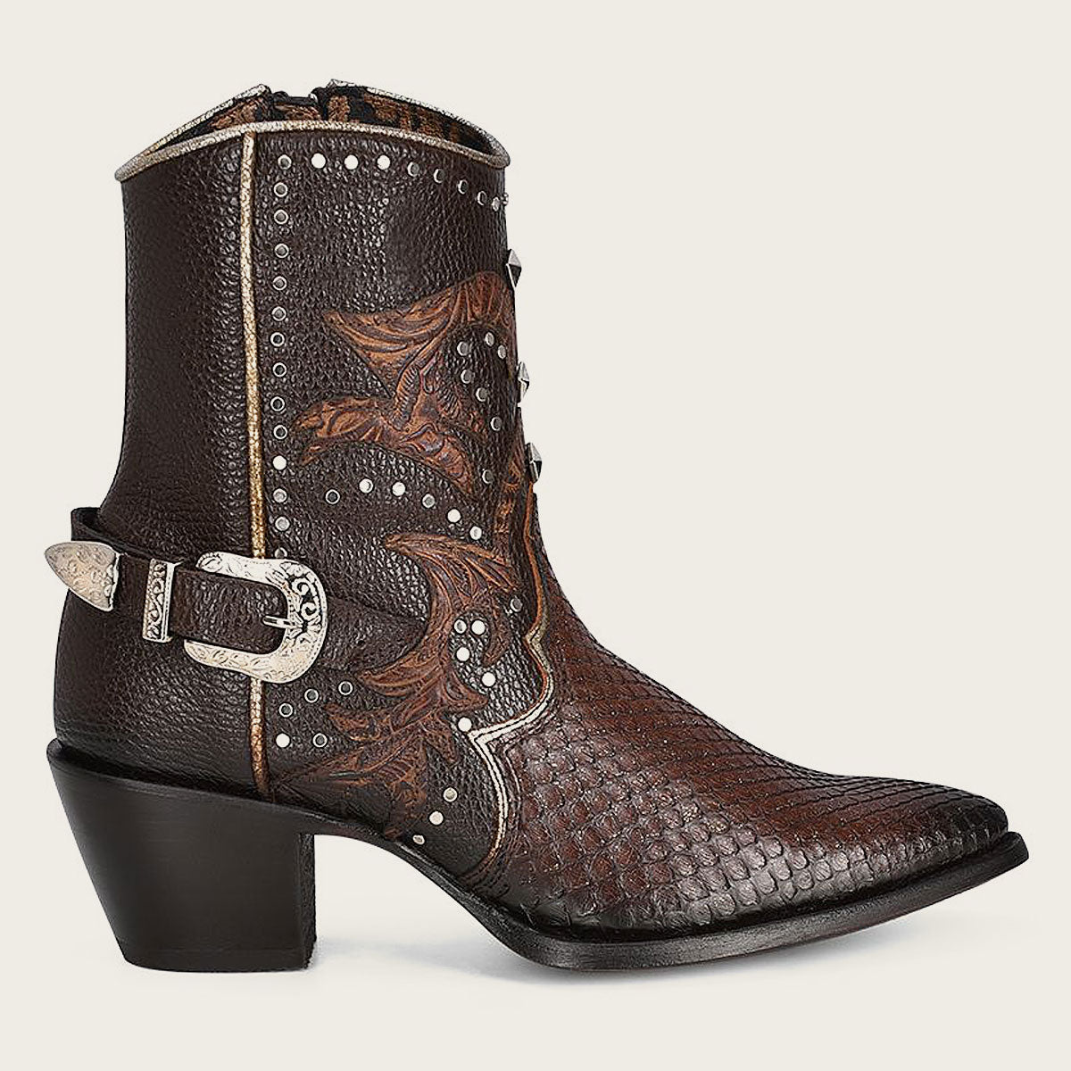 Strap around ankle with metallic buckle