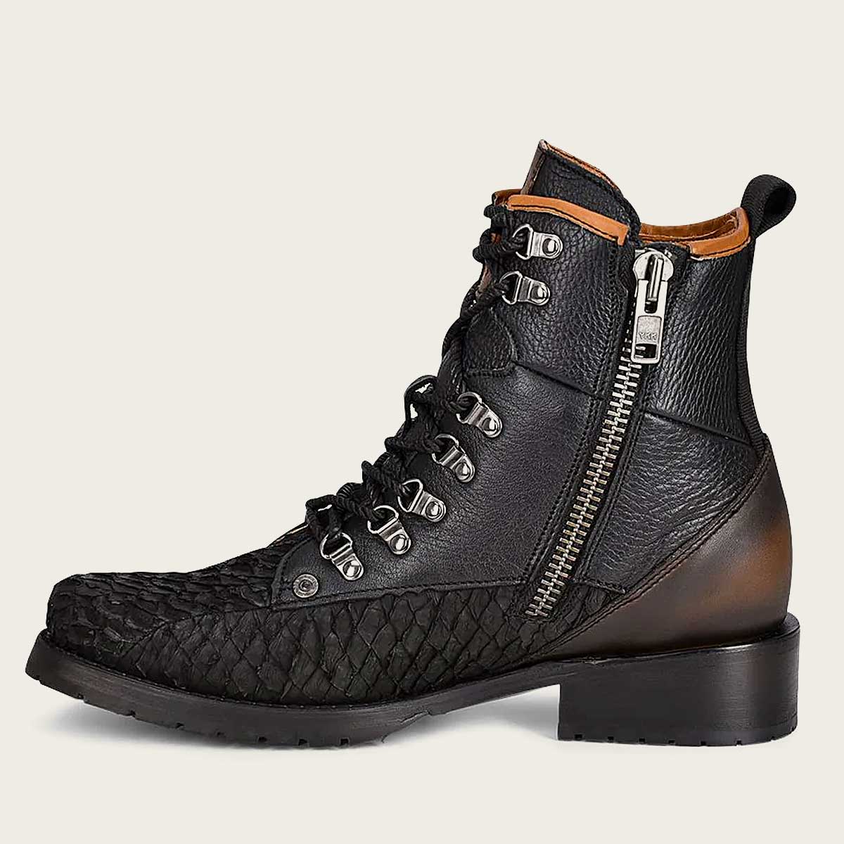 Stylish black poisson leather ankle boots for men, inspired by mining style with metallic accents.