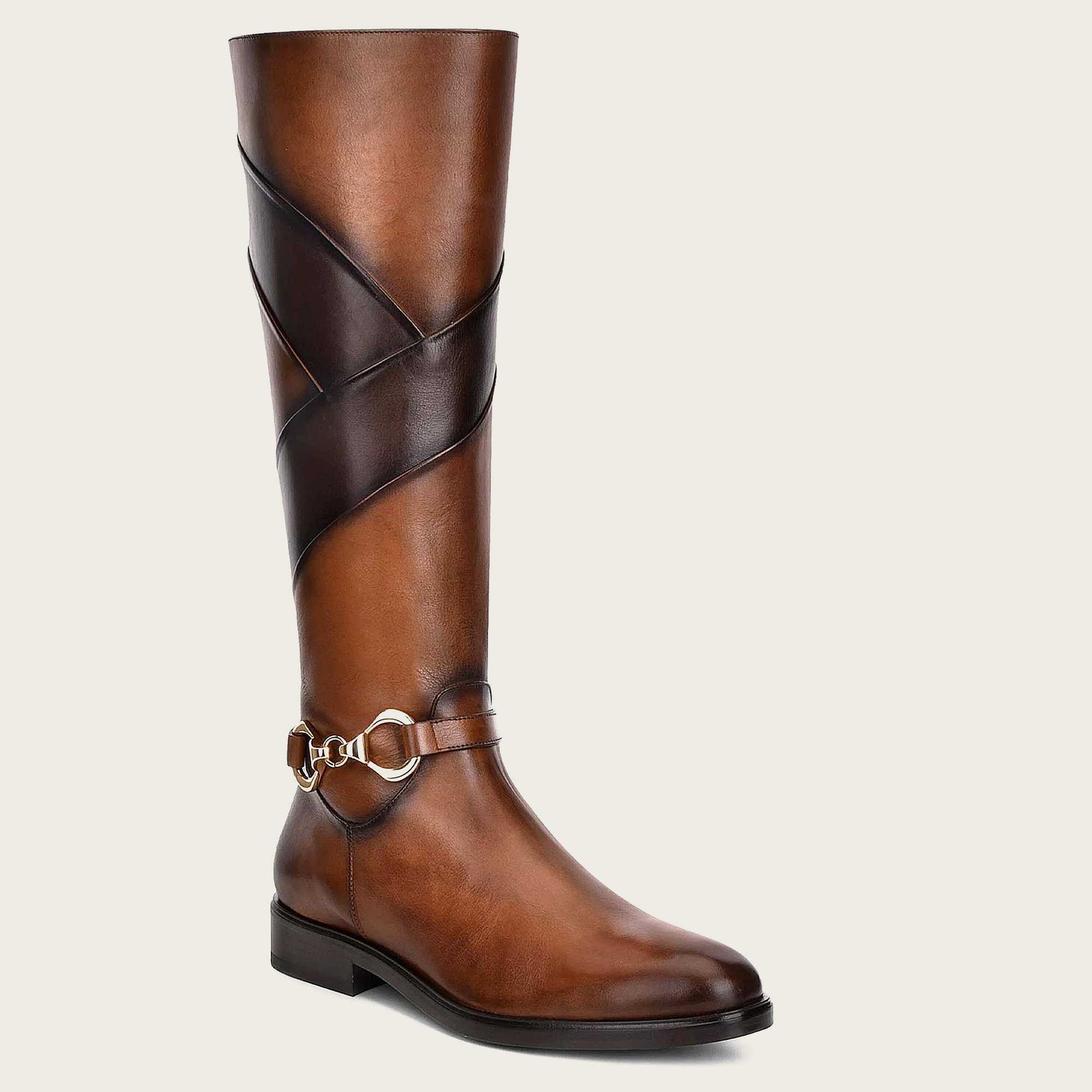 Hand-painted honey leather riding boot with contrasting colors and fine metallic detailing.