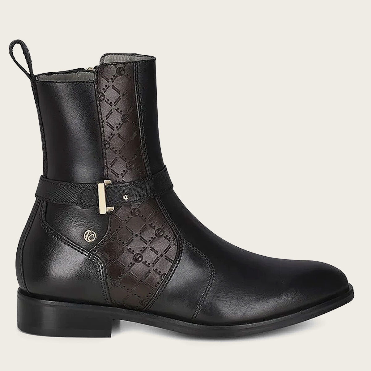 Hand-painted black leather engraved bootie. Unique and stylish. Shop now for a bold addition to your footwear collection