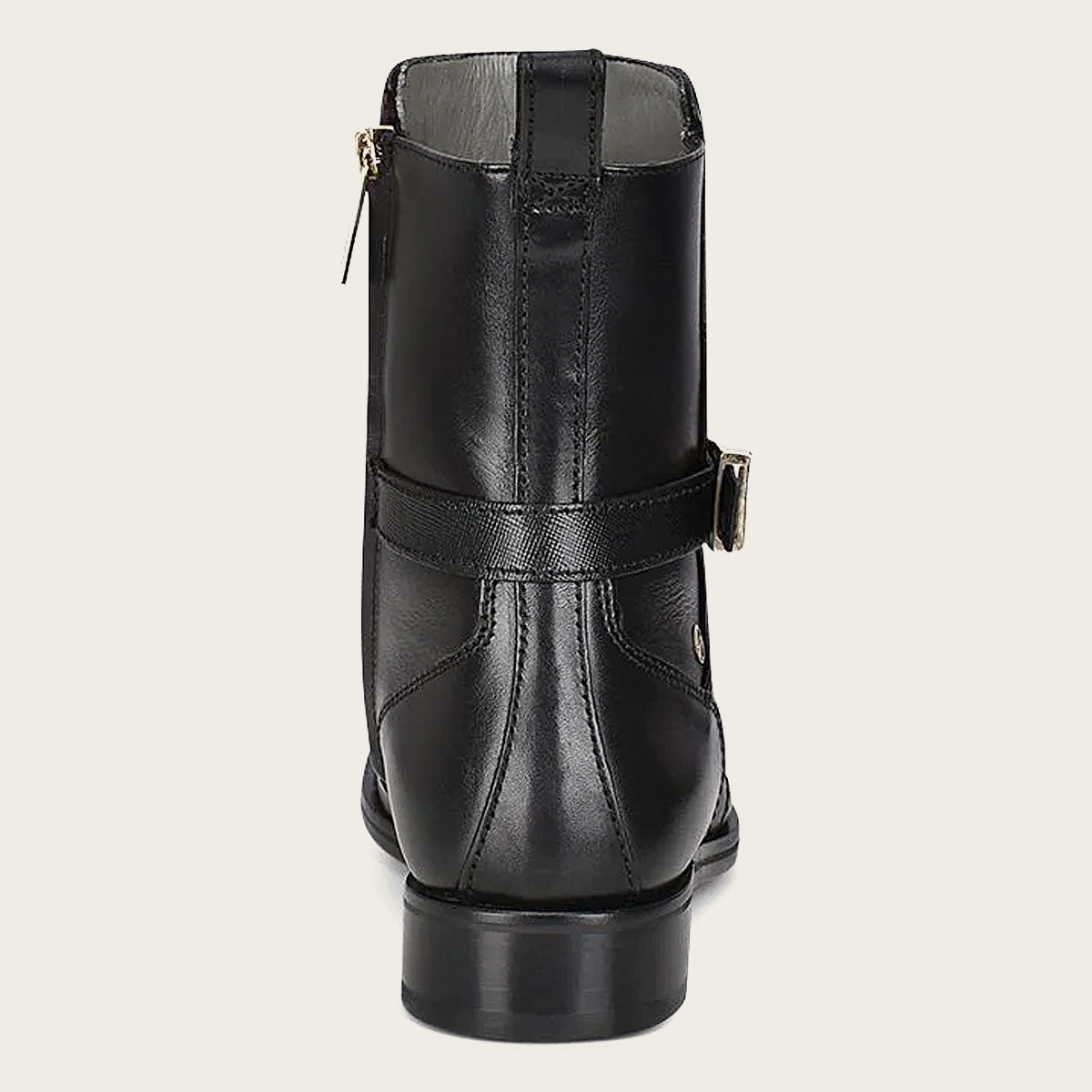 Hand-painted black leather engraved bootie. Unique and stylish. Shop now for a bold addition to your footwear collection