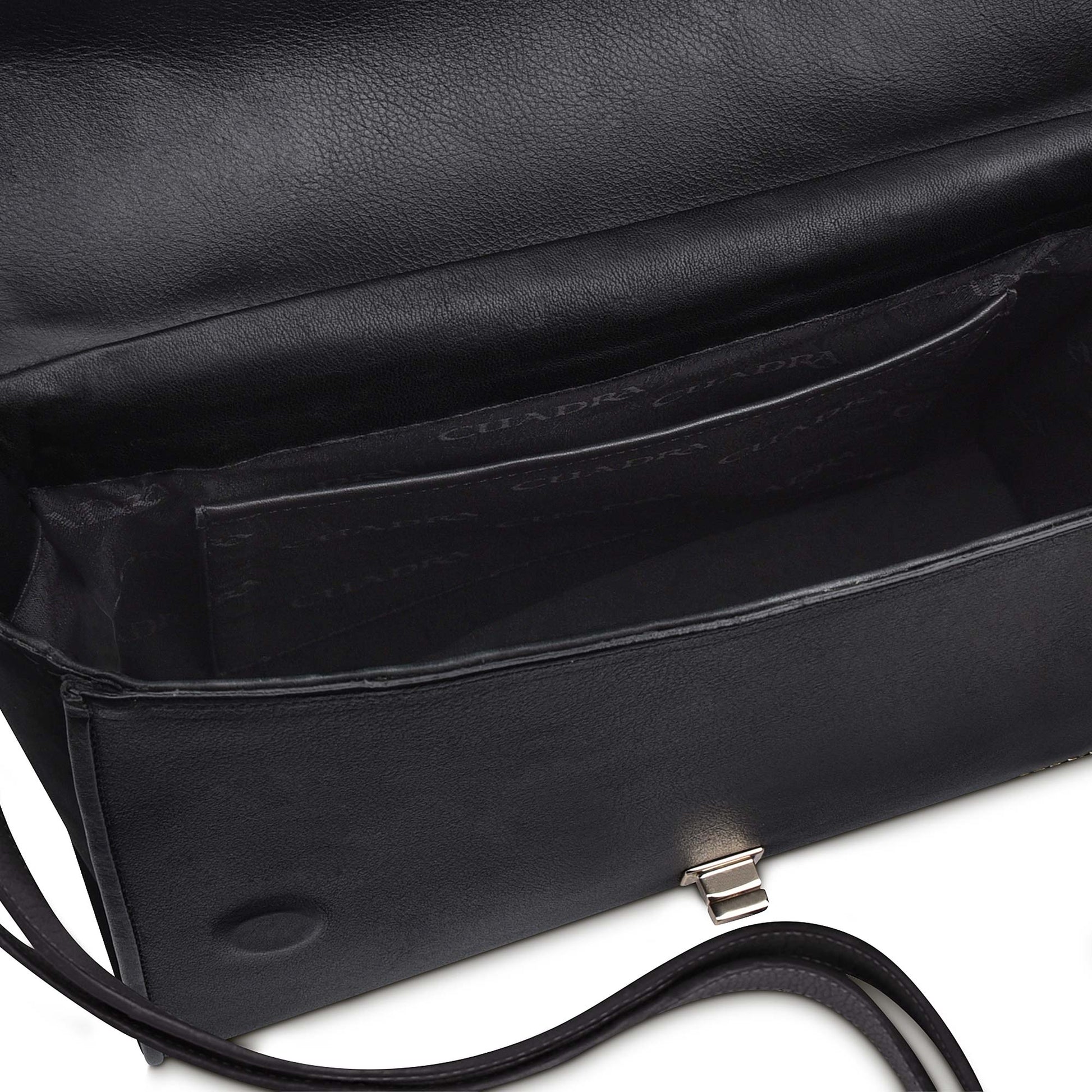 the leather bag has an inner small compartment, perfect for cards or cash